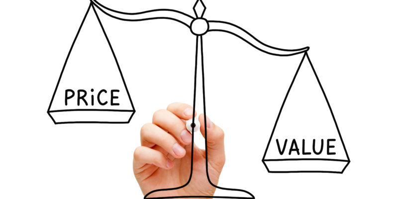 Understand Your Business With Marketing Math Hand drawing Value Price scale concept with black marker on transparent wipe board isolated on white.