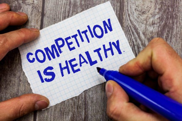 Handwriting text writing Competition Is Healthy. Concept meaning Rivalry is good in any Venture leads to Improvement.