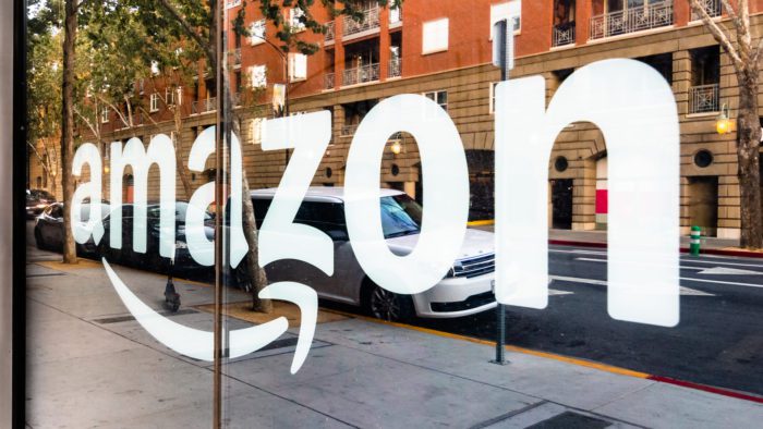 May 12, 2019 San Jose / CA / USA - Amazon sign on the window of the Amazon Hub Locker in the downtown area, Silicon Valley